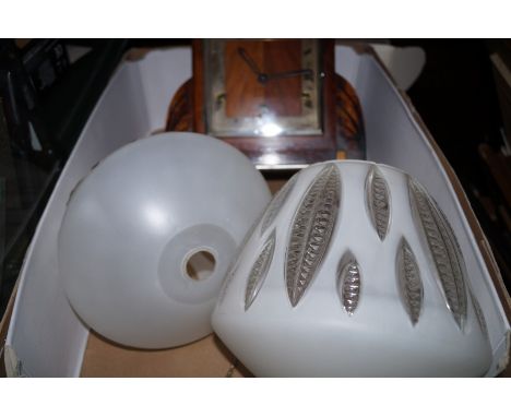 Art deco mantle clock together with a pair of retro light shades