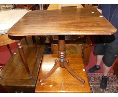 An early Victorian mahogany round cornered tilt-top pedestal tripod occasional table, length 69cm 