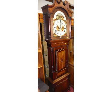 An early 19th century Welsh oak and mahogany cross banded long case clock having an arch painted moon phase dial, twin windin