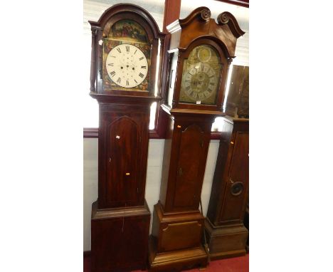 A 19th century mahogany longcase clock, having an arched brass and silvered dial, twin winding holes for an eight-day movemen