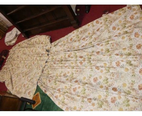 Three pairs of double pinch pleat curtains each width 124cm, drop 222cm, each decorated with flowers on a white ground