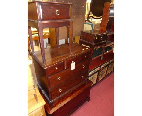 Stag Minstrel bedroom furniture to include low chest of three short and two long drawers, a hinged blanket box, and a pair of