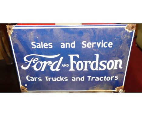 An enamel on metal slightly convex wall mounted advertising sign for Ford and Fordson, 19.5x29.5cm