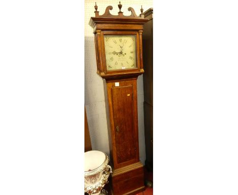 A circa 1800 provincial oak longcase clock, having a painted square dial signed John Wood Grantham, twin winding holes for an