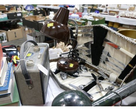Vintage radio, box of cutlery and a adjustable desk lamp
