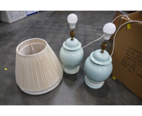 Pair of green ceramic lamps and lampshades 