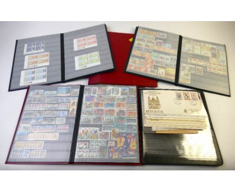 Four albums of UK and world stamps, First Day Covers, mixed mint and used and empty album