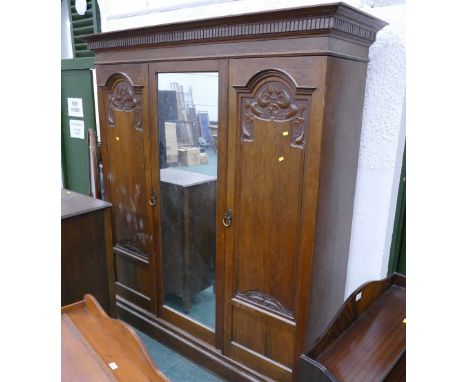Edwardian carved mirror fronted triple wardrobe 217 cm high, 181 cm wide, 57 cm deep