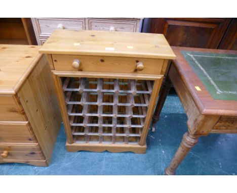 Pine wine rack with single drawer above 