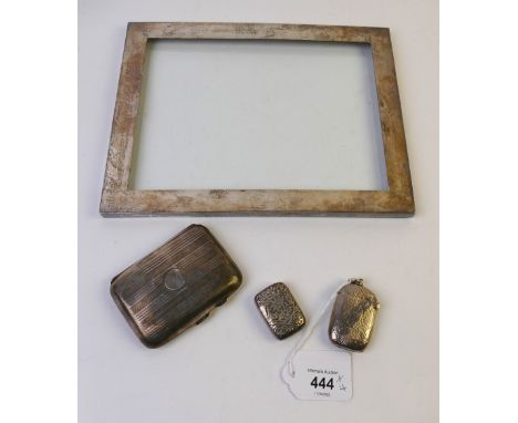 Two silver Vesta cases weight 39 grams, silver fronted cigarette case and silver scrap picture frame surround, weight +/- 140