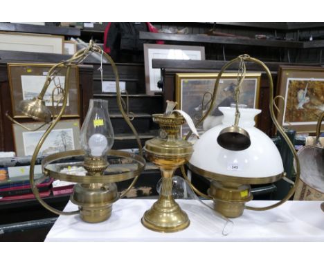 Pair of antique style ceiling hung brass oil lamp light fittings and brass oil lamp base 