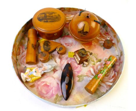 Collection of Mauchlinware antique sewing accessories - needle holders, tape measures, pin cushions, thread holders and a cop