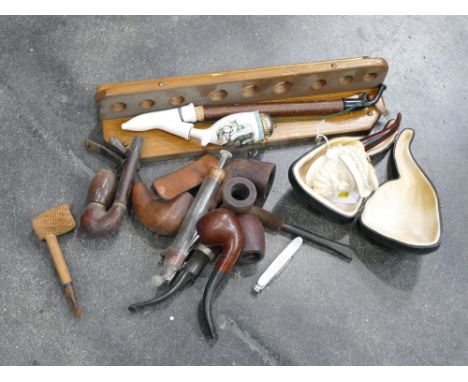 Vintage pipes and a pipe rack 