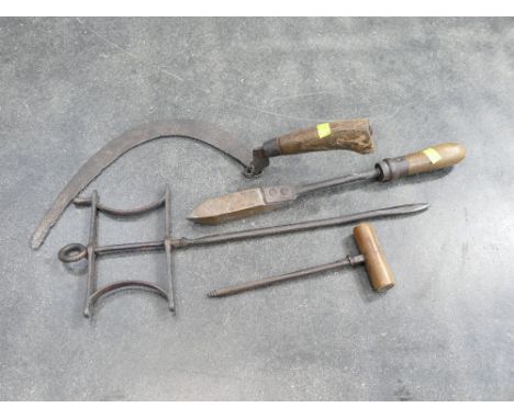 Antique scythe, auger and other tools