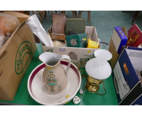 Box of ceramics, clock, mismatched wash jug and bowl, electric oil lamp