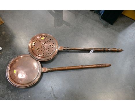Two long armed bed warming pans 