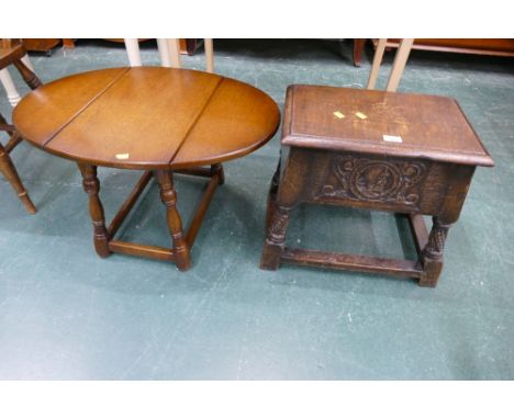 17th century style carved oak joined stool/storage box with hinged lid 51 cm long 34 cm wide 44 cm high with a small drop fla