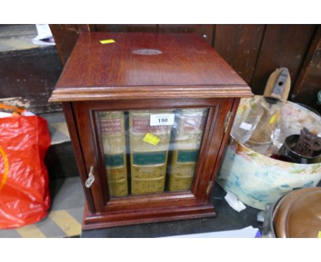 Mahogany case with three volumes of Encyclopedia Britannica etc 