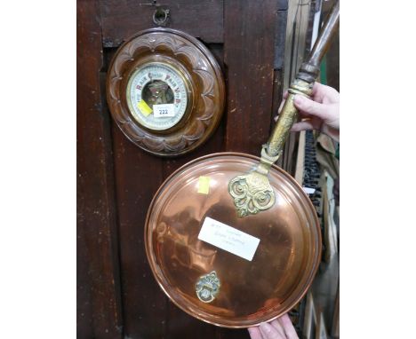 Long handled brass and copper bed warming pan and a barometer 