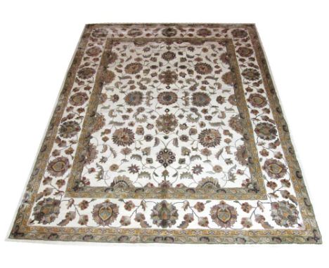 SHAH ABBAS DESIGN CARPET, 310cm x 244cm, all over palmettes and vines on an ivory field within a corresponding border. 