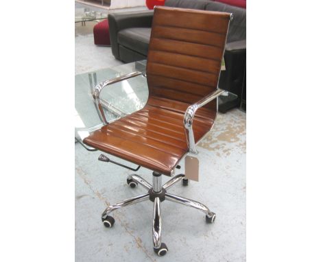 REVOLVING DESK CHAIR, Charles Eames design ribbed tan brown leather, revolving and reclining on an adjustable base with casto