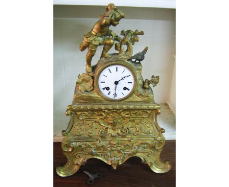 MANTEL CLOCK, late 19th century gilt metal with child and pheasant surmount, the dial and bell striking movement inscribed 'D