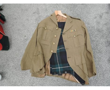 A British Army Jacket and Scottish  Tartan Trews, The Queens Own Cameron Highlanders Buttons, 4 small and 4 large, comes with