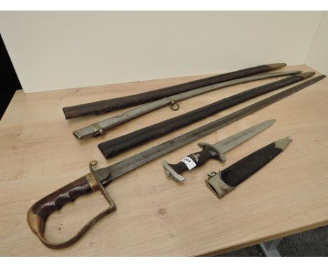 A reproduction German Dagger along with an unknown Sword in af condition, two leather scabbards and a metal scabbard