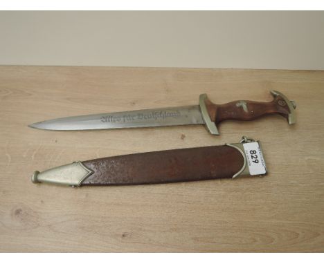 A WWII German SA Service Dagger with scabbard, makers mark F.Dick Esslingen, blade length 22cm, overall length 34cm