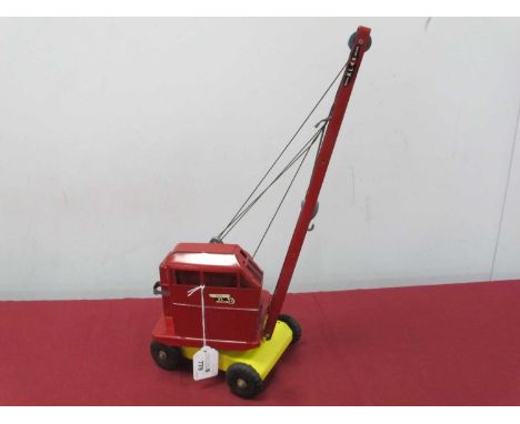 A Promotional Model Triang Tinplate Jones KL44 Crane. Yellow Base with underside detailing that 'A model of the 4 ton Jones M