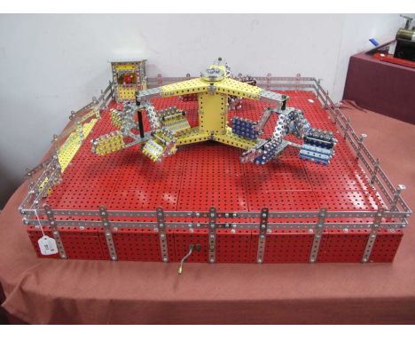 A Hand Built (Post War) Meccano Model in the form of a Fairground Twister Ride, featuring a hand crank which rotates the cart