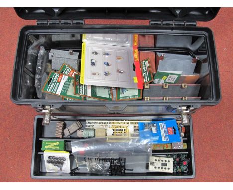 A Metal Case Containing a Quantity of 'OO' Gauge/4mm Trackside Buildings and Accessories, comprising ten Hornby resin buildin