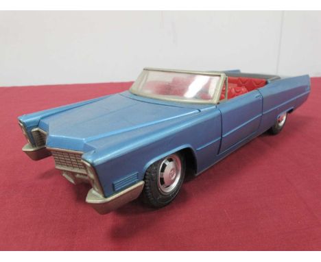 A 1970s Schuco 5505 Battery Operated Model of a Cadillac two door convertible, blue, appears body unbroken fault to steering,