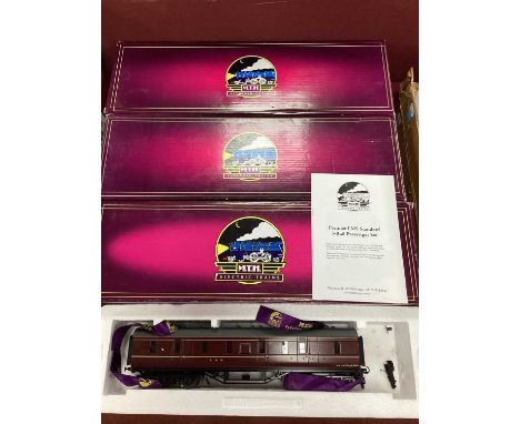 Four M.T.H 'O' Gauge/7mm Boxed MKI Coaches, comprisingRef 20-60006 3 Rail L.M.S maroon baggage car; Ref 22-60038 Coronation S