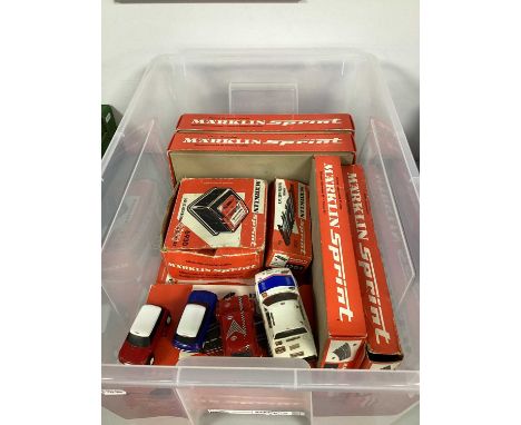 Ten Boxes of Marklin Slot Racing Track and Transformer with Four Scalextric Cars.