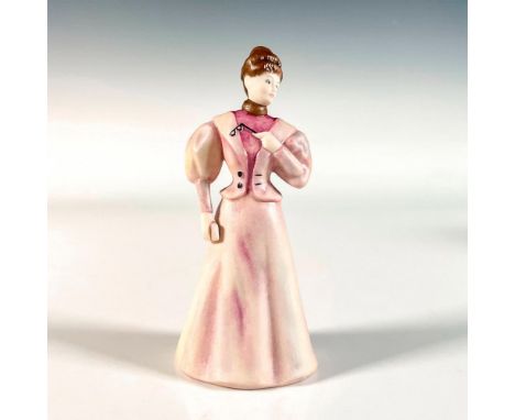 Hand painted in matte finish. Small sized figure of lady in lavender gown carrying her glasses. Goebel backstamp. This item h