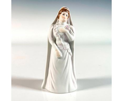 Hand painted in matte finish figure of a bride in her lovely wedding gown. Goebel backstamp. This item has its original box. 
