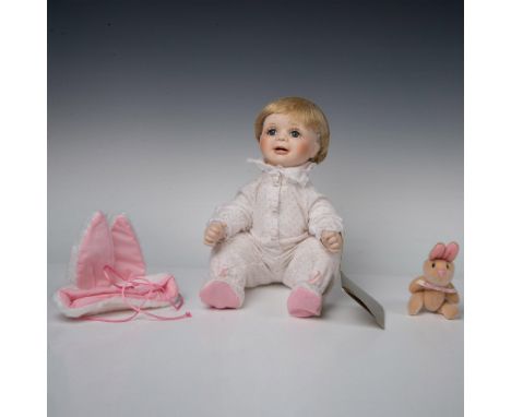 Introducing the Georgetown Collection Baby Bunting doll, a precious blond baby with blue eyes, rosy cheeks, and adorned in a 