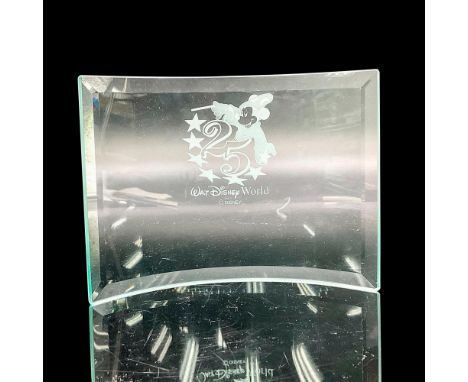 Clear curved glass with and etched image of Mickey dressed in his Fantasia costume. To celebrate Disney World's 25th Annivers