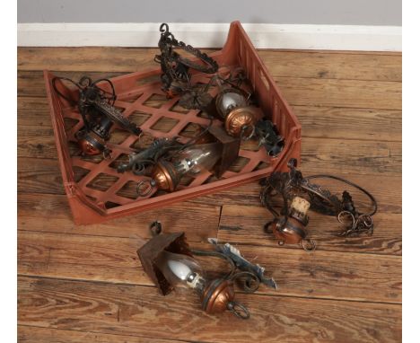 Two sets of copper light fittings to include chandelier and wall sconce styles.  Both sets with damage.