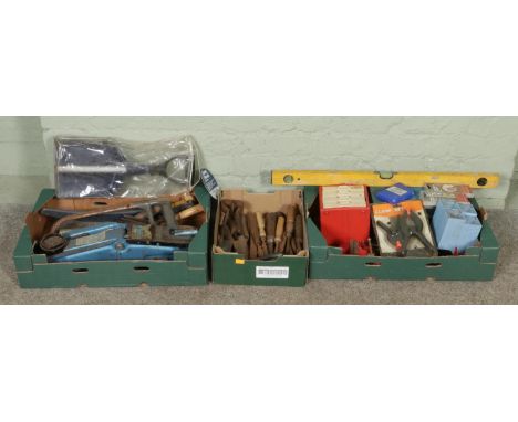Three boxes of vintage tools and accessories, including assorted hand tools, hammer, drill bit sets, car jack and snow shovel