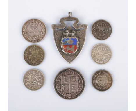A silver sporting fob, together with a small quantity of silver coinage. The fob awarded to T.Morley, Kiveton Park Colliery C