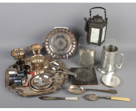 A collection of metalware, including assorted silver-plated items, sterling silver ring jam spoon and pewterware, including a