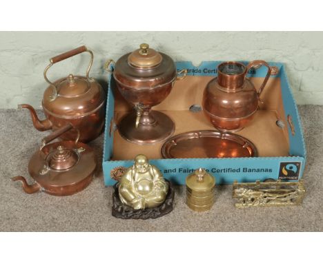 A box of metalware, including a vintage copper tea urn, teapots, plate, and pitcher, together with a brass laughing Buddha, l