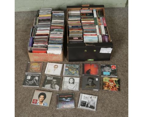 Two boxes of assorted CD's of mainly pop and rock to include  Elvis Presley, Arctic Monkeys, Rihanna, Oasis, Beyonce, Lady Ga