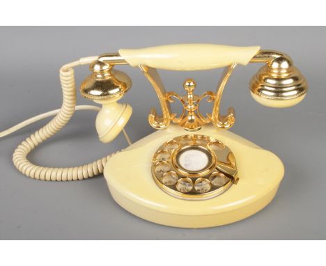 A vintage Japanese Teleconcepts "Countess" rotary dial telephone.
