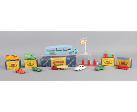 A collection of Matchbox Moko Lesney miniature scale model vehicles and accessories, including No. 2 car transporter, No. 37 