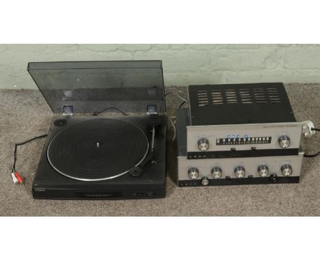 A Leak hi-fi system comprising of a Trough Line 3 FM Tuner and Stereo 30 Amplifier along with a Sony servo controlled turntab