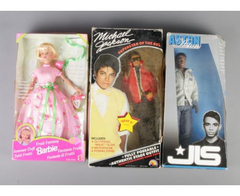 Three boxed collector's dolls. Includes LJN Michael Jackson Beat It 1984, Mattel Barbie Fruit Fantasy 1998 and Vivid JLS Asto