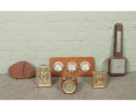 A collection of clocks and barometers, to include SB barometer, Romatic and London Clock Co examples.